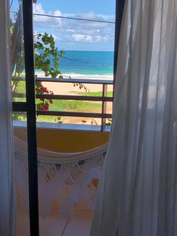  Condomínio com Apartamentos a Beira Mar