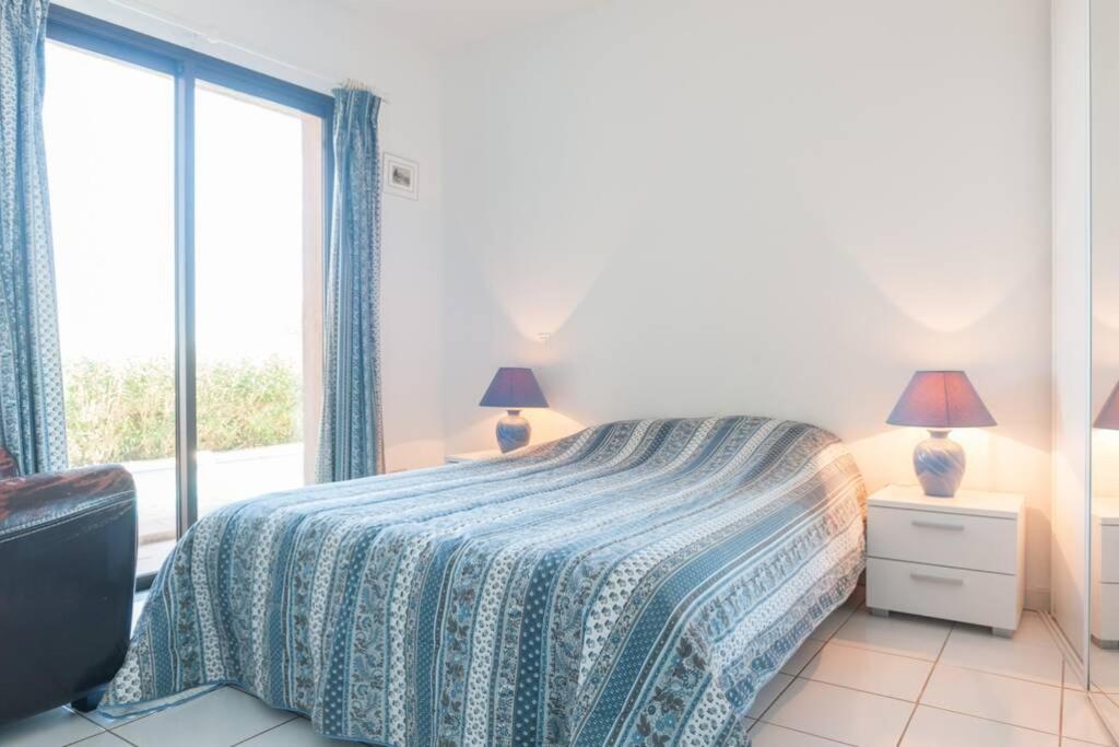 Ένα ή περισσότερα κρεβάτια σε δωμάτιο στο Villa Pétale de Rose