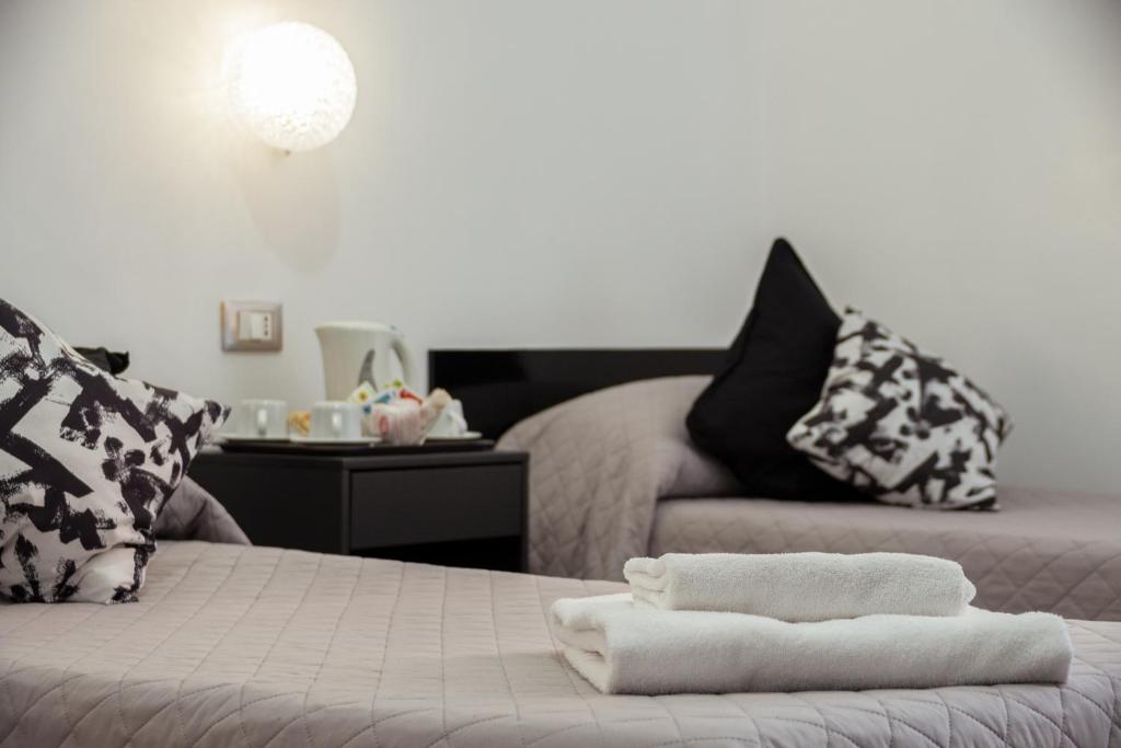 Postel nebo postele na pokoji v ubytování Hotel Sol Levante