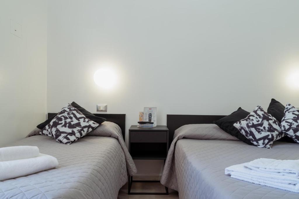 Postel nebo postele na pokoji v ubytování Hotel Sol Levante
