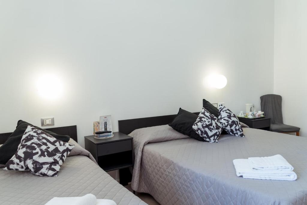 Postel nebo postele na pokoji v ubytování Hotel Sol Levante