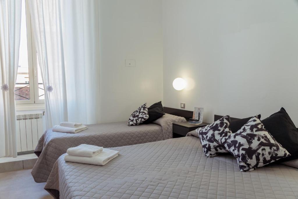 Postel nebo postele na pokoji v ubytování Hotel Sol Levante