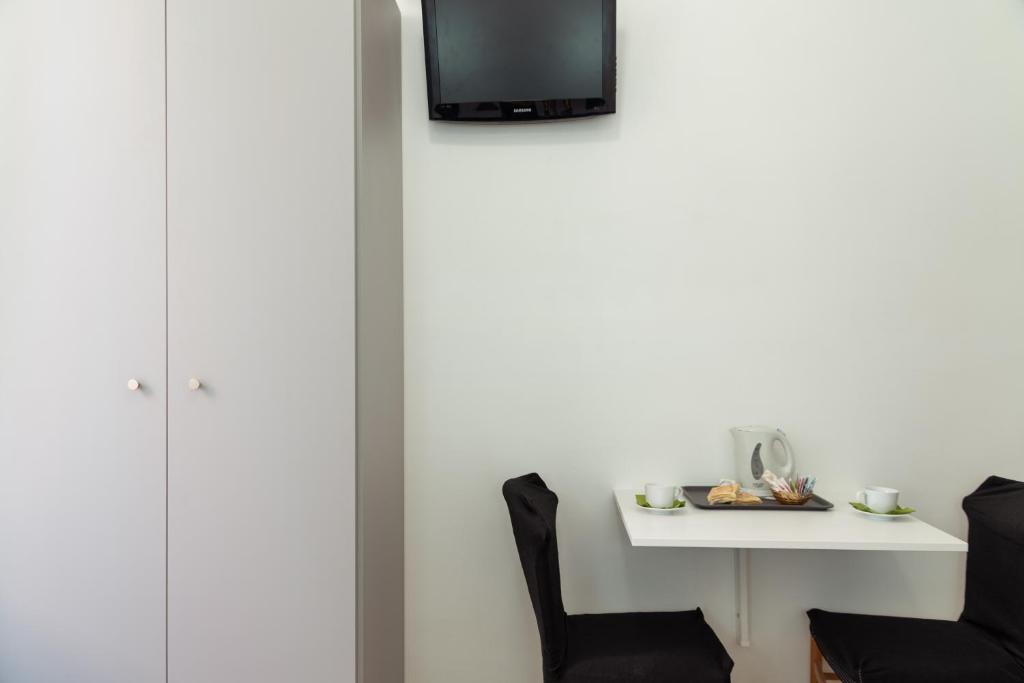 TV a/nebo společenská místnost v ubytování Hotel Sol Levante