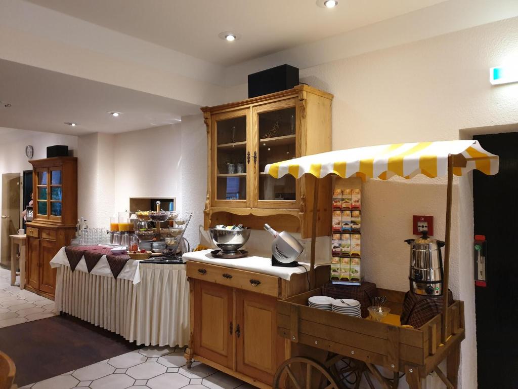 Kuchyň nebo kuchyňský kout v ubytování Avantgarde Hotel