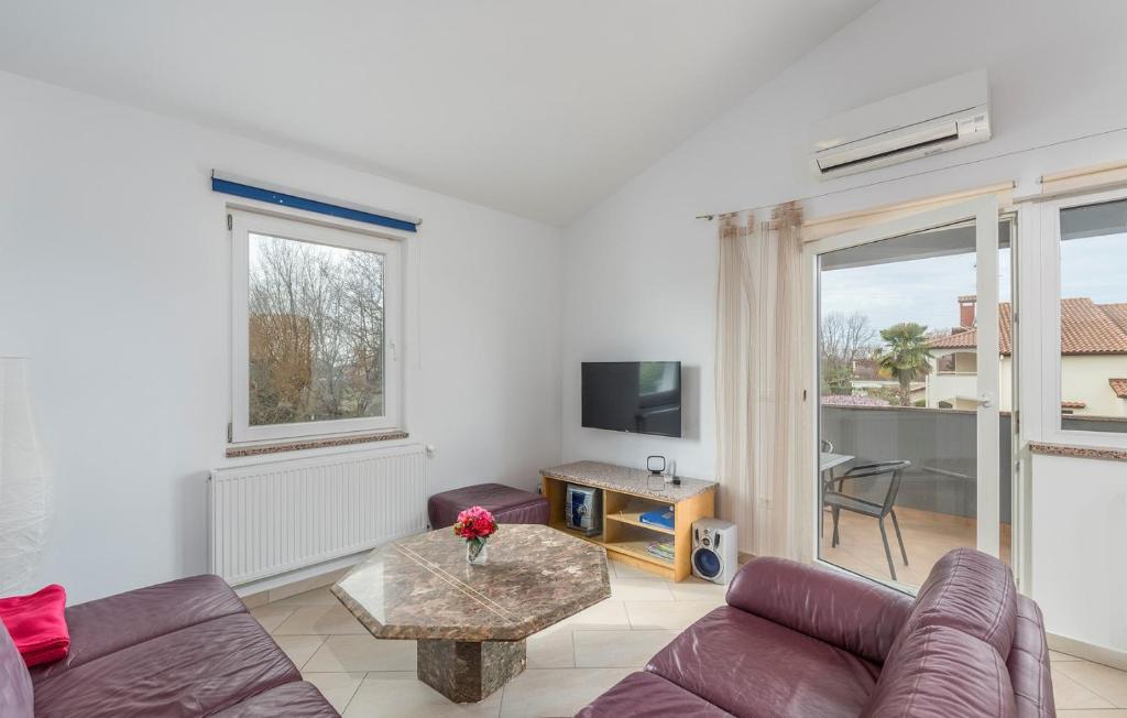 TV a/nebo společenská místnost v ubytování Apart Residence Leko