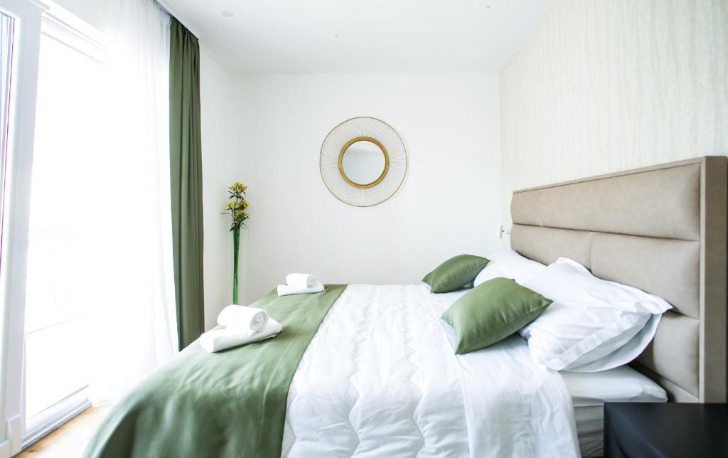 Ένα ή περισσότερα κρεβάτια σε δωμάτιο στο Kaša Rooms 2