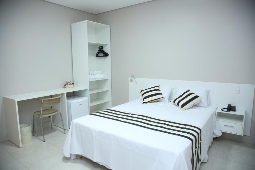 Postel nebo postele na pokoji v ubytování Ventura Hotel