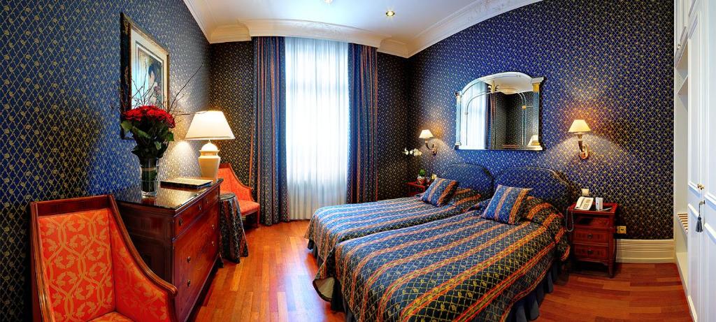 Postel nebo postele na pokoji v ubytování Hotel Liebig