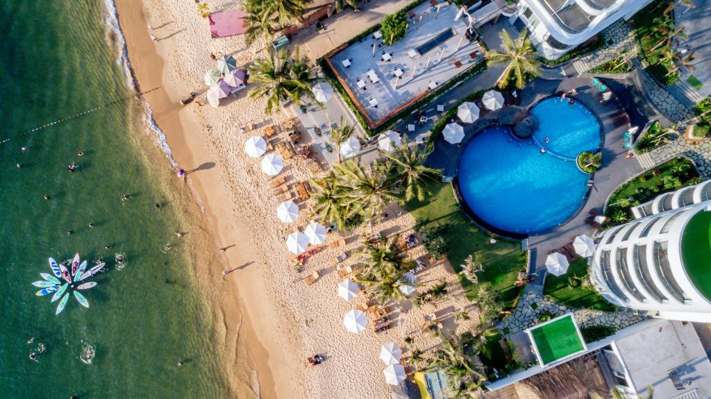 an overhead view of a beach with umbrellas and the ocean at Sunset Beach Resort and Spa in Phu Quoc