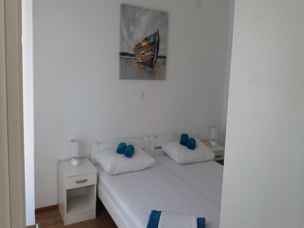 Postel nebo postele na pokoji v ubytování Villa Nika