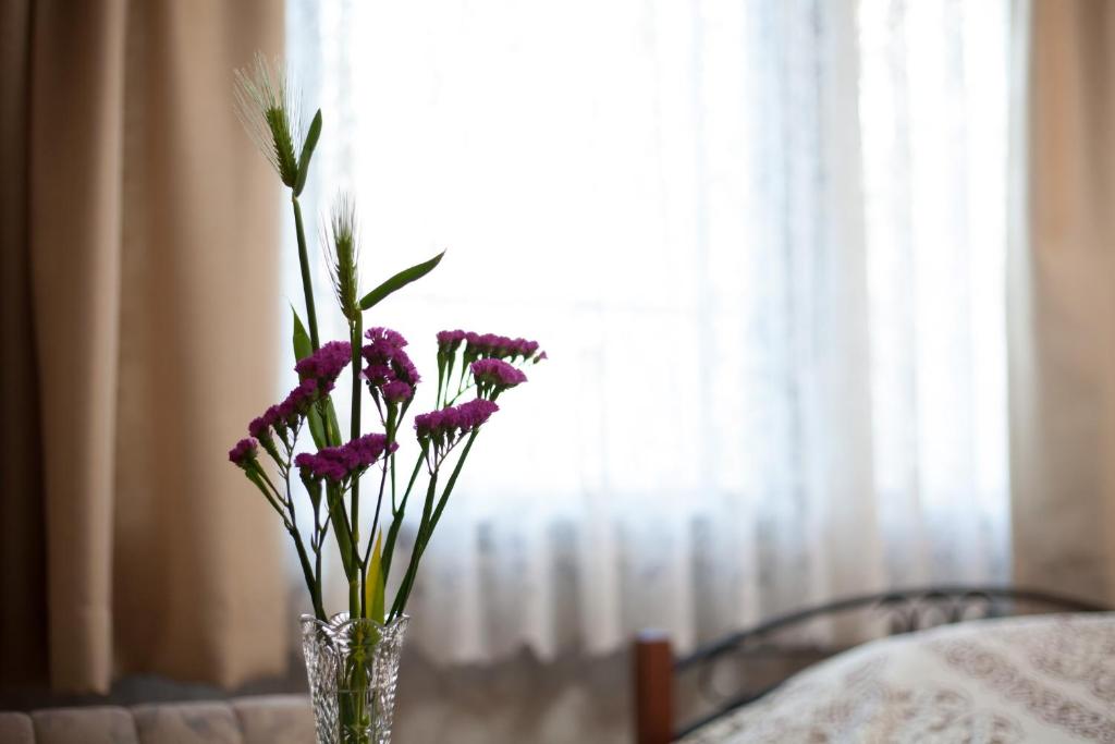 Postel nebo postele na pokoji v ubytování Kyo Obataya