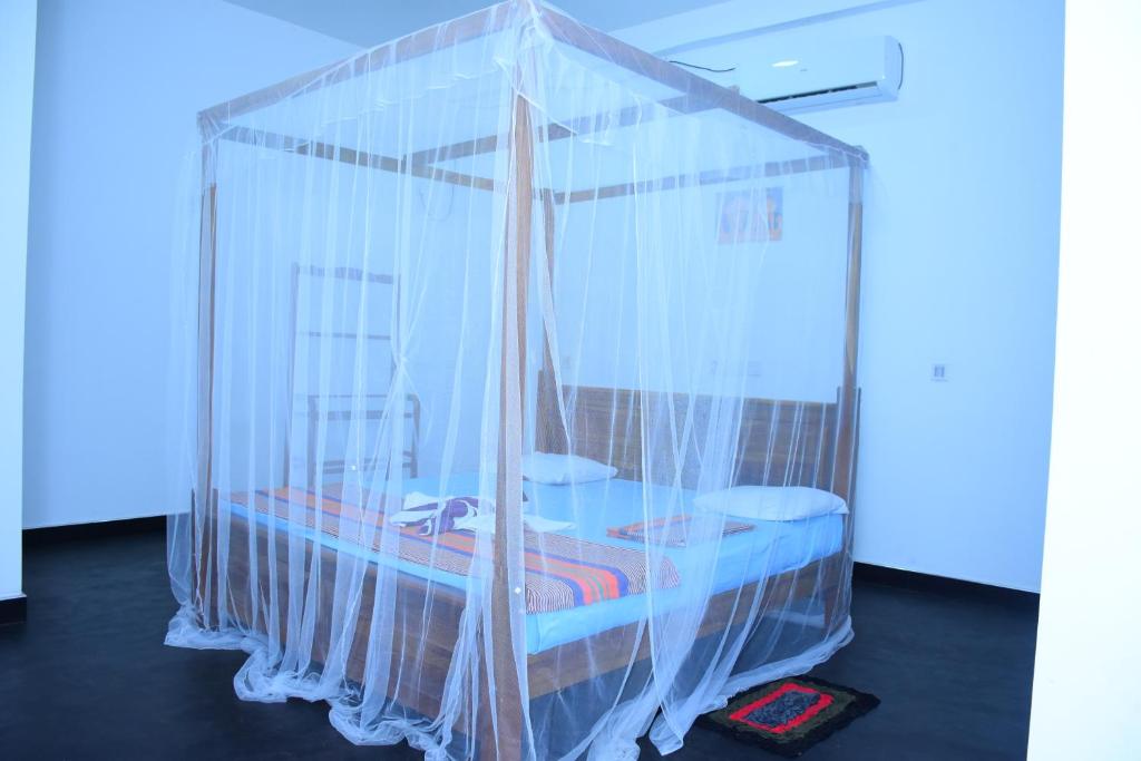 Postel nebo postele na pokoji v ubytování Kuma Safari Lodge