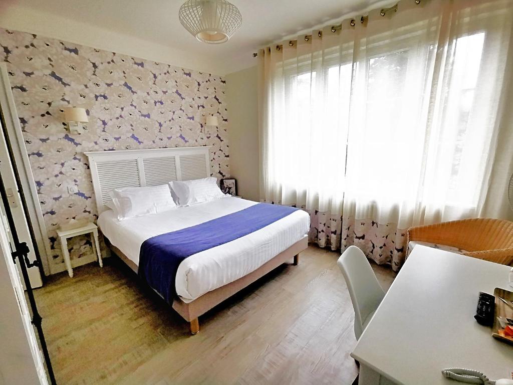 Postel nebo postele na pokoji v ubytování La Ramade - Teritoria