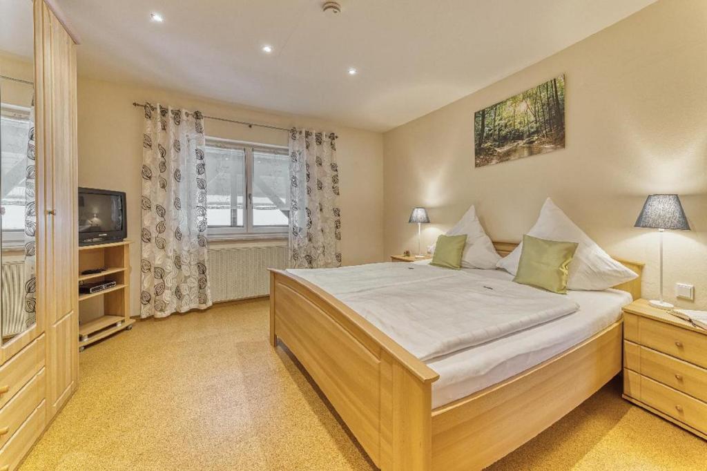 Postel nebo postele na pokoji v ubytování Hotel Hirschenstein