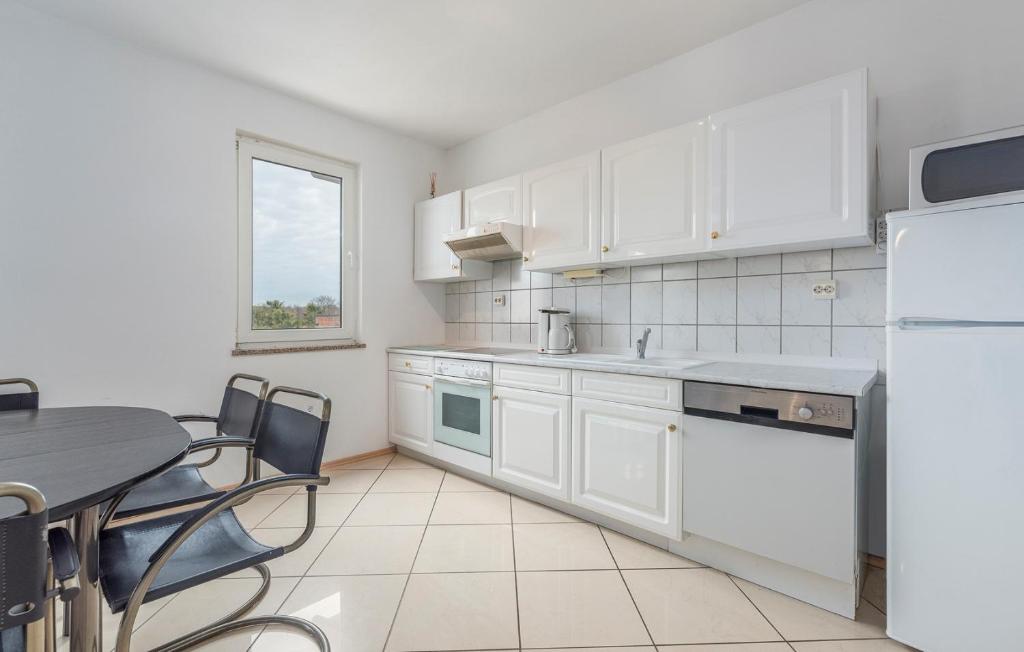 Kuchyň nebo kuchyňský kout v ubytování Apart Residence Leko