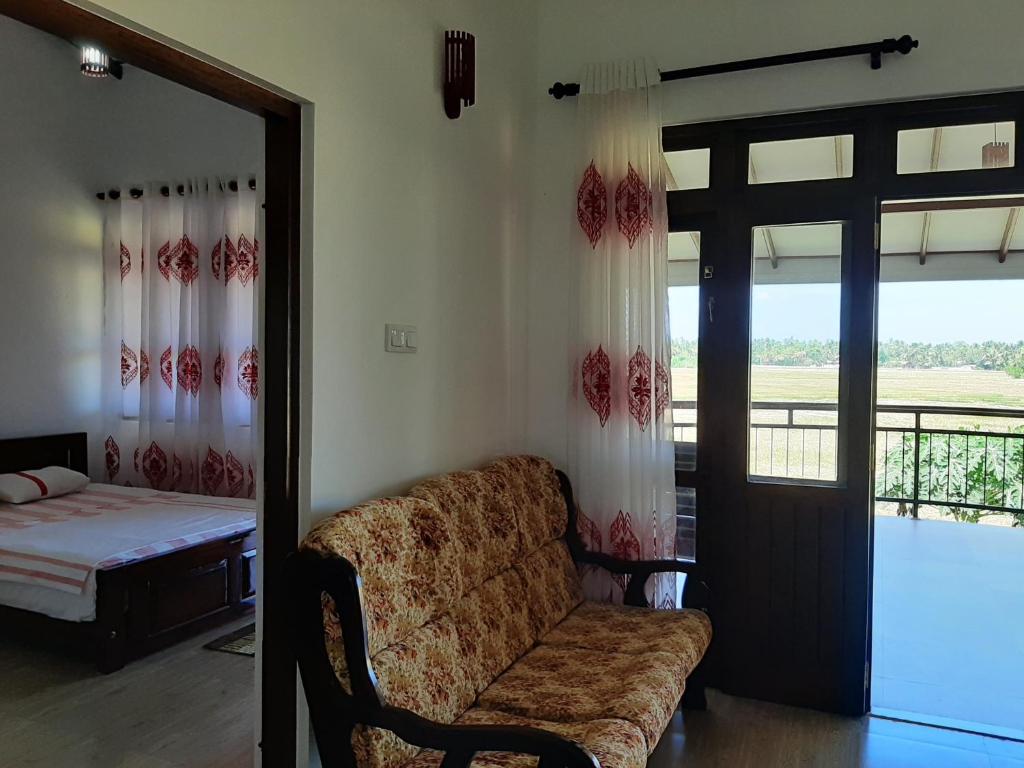 Postel nebo postele na pokoji v ubytování Lavender Home Yala Safari