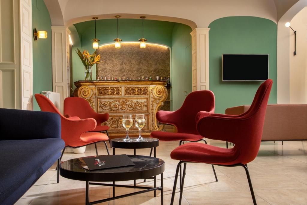 TV a/nebo společenská místnost v ubytování Hotel Colosseum