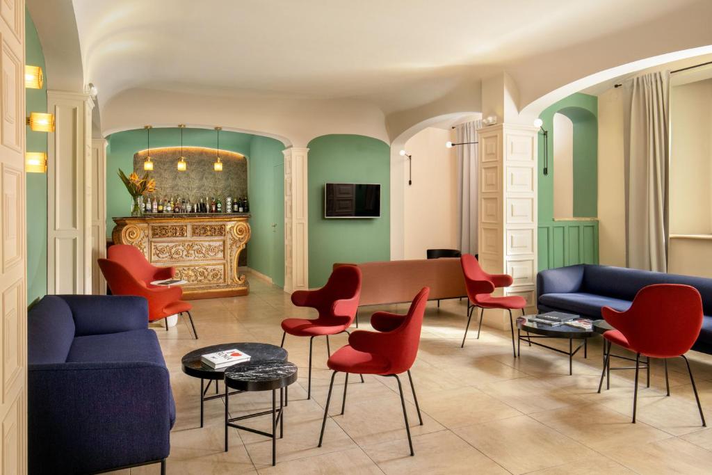 TV a/nebo společenská místnost v ubytování Hotel Colosseum