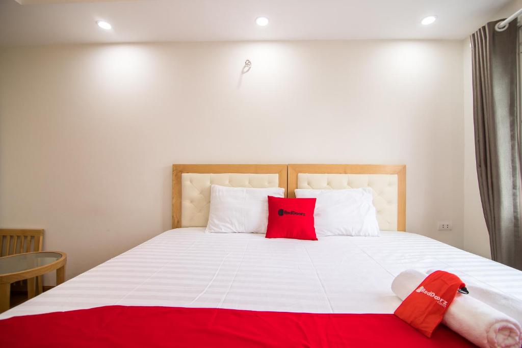 Postel nebo postele na pokoji v ubytování Newstyle Apartment Tran Duy Hung