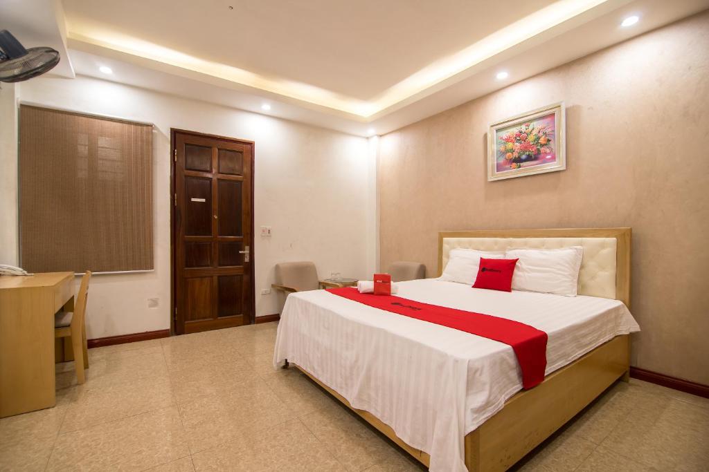 Postel nebo postele na pokoji v ubytování Newstyle Apartment Tran Duy Hung