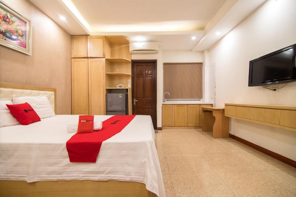 Postel nebo postele na pokoji v ubytování Newstyle Apartment Tran Duy Hung