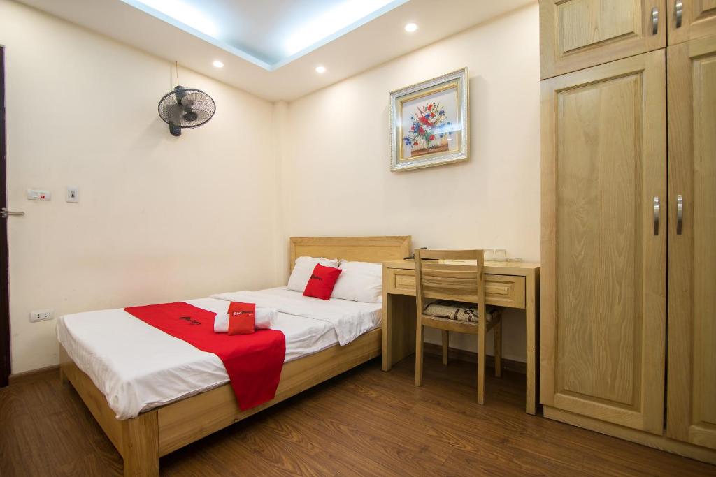 Postel nebo postele na pokoji v ubytování Newstyle Apartment Tran Duy Hung