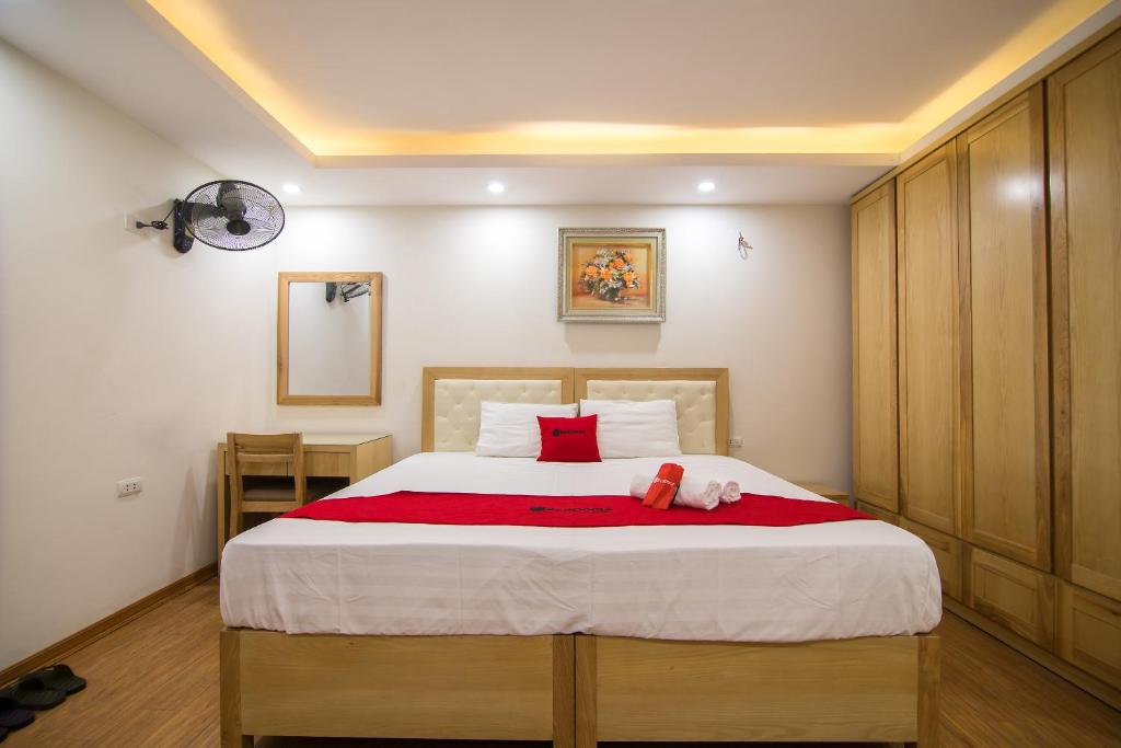 Postel nebo postele na pokoji v ubytování Newstyle Apartment Tran Duy Hung