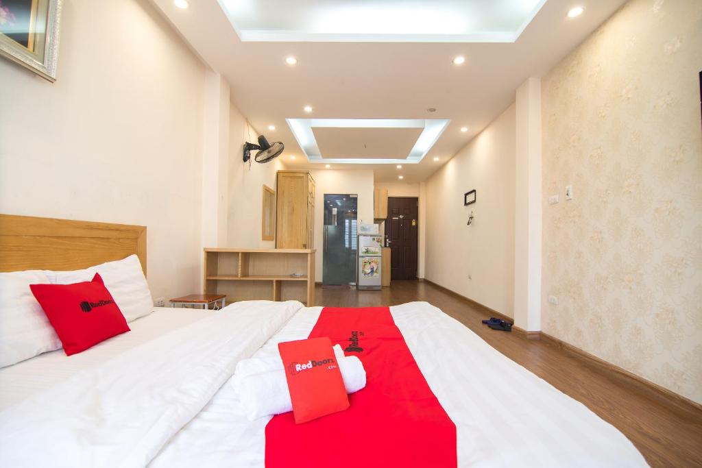 Postel nebo postele na pokoji v ubytování Newstyle Apartment Tran Duy Hung