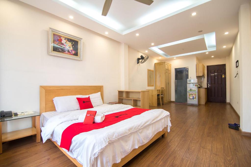 Postel nebo postele na pokoji v ubytování Newstyle Apartment Tran Duy Hung