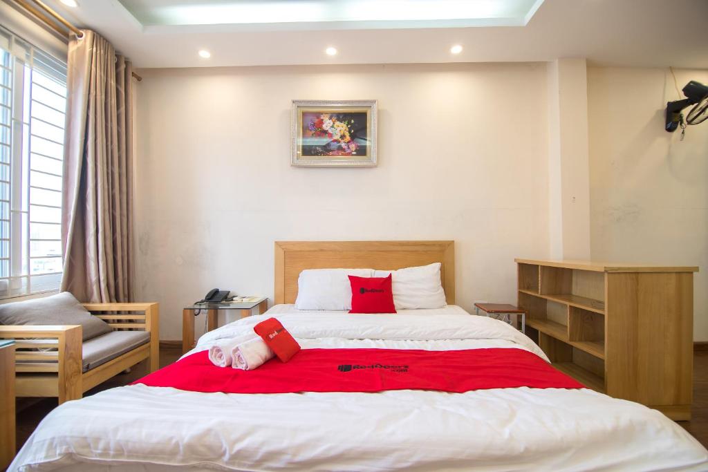 Postel nebo postele na pokoji v ubytování Newstyle Apartment Tran Duy Hung
