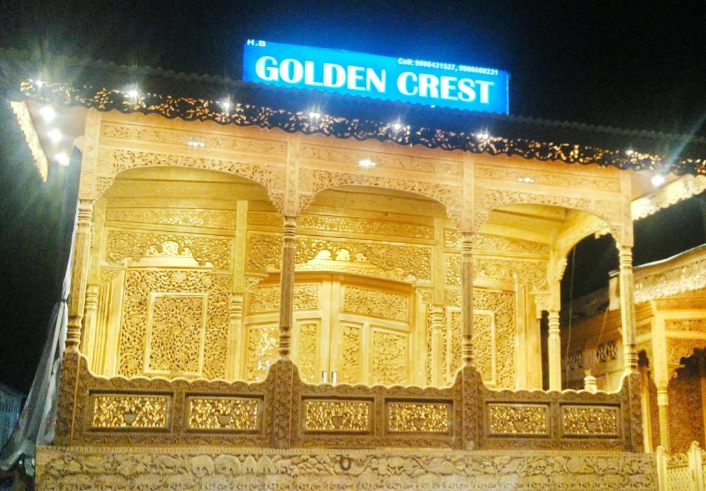 a building with a sign that reads golden crest at Golden Crest DALLAKE in Srinagar
