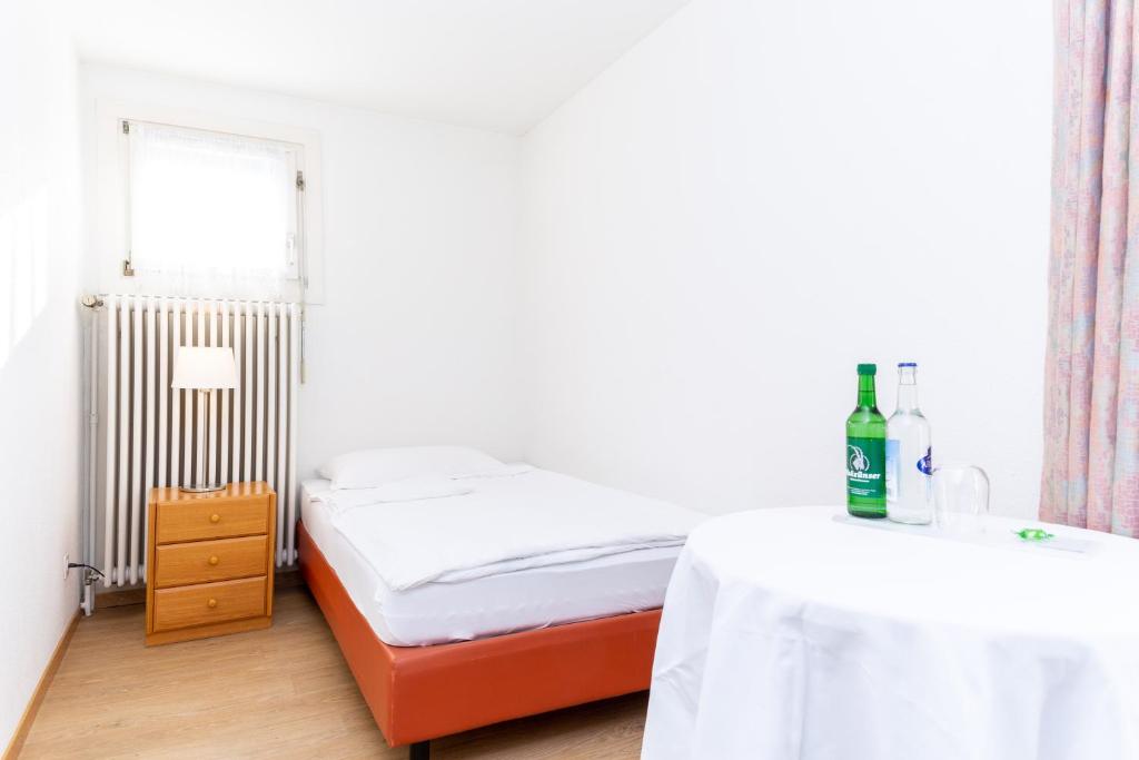 Postel nebo postele na pokoji v ubytování Hotel Alfa