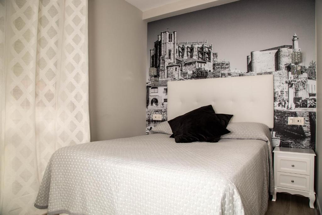 Postel nebo postele na pokoji v ubytování Alojamientos Rooms Catamarán