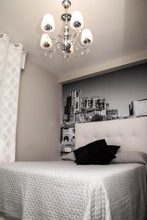 Postel nebo postele na pokoji v ubytování Alojamientos Rooms Catamarán