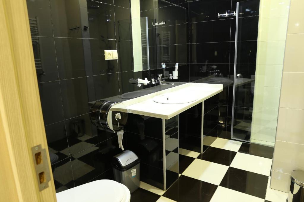 Koupelna v ubytování Dkd-bridge Hotel