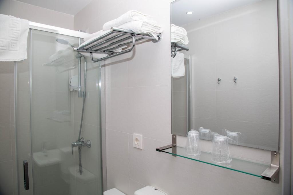 Koupelna v ubytování Alojamientos Rooms Catamarán