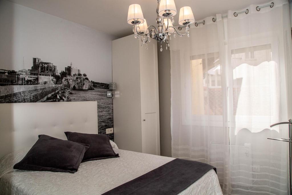 Postel nebo postele na pokoji v ubytování Alojamientos Rooms Catamarán