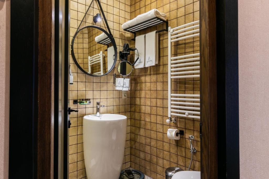 Koupelna v ubytování Hotel Adamo
