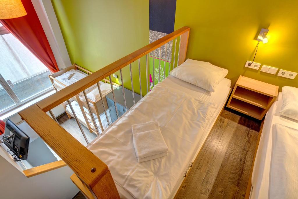 Postel nebo postele na pokoji v ubytování MEININGER Hotel Berlin Mitte