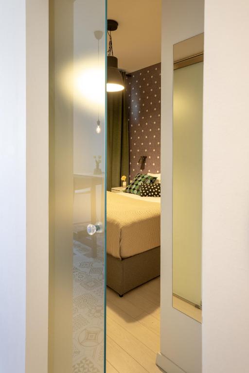 Postel nebo postele na pokoji v ubytování Rooms Nela