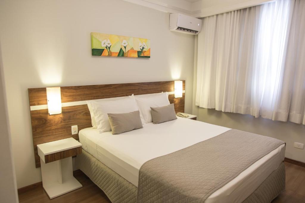 Postel nebo postele na pokoji v ubytování Hotel Princess