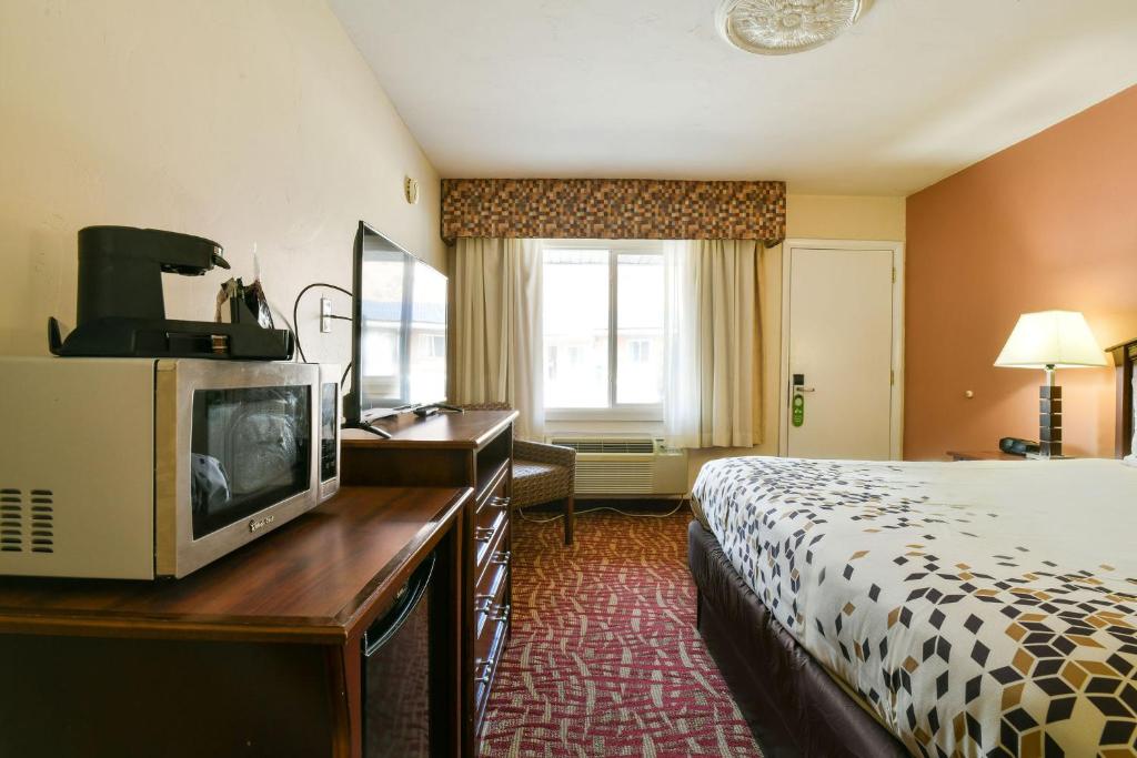 Postel nebo postele na pokoji v ubytování Inca Inn Moab