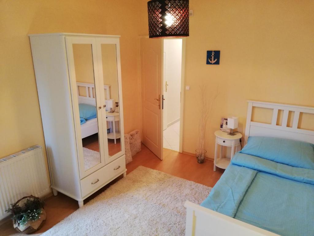 Posteľ alebo postele v izbe v ubytovaní Bella Golden Beach Siófok