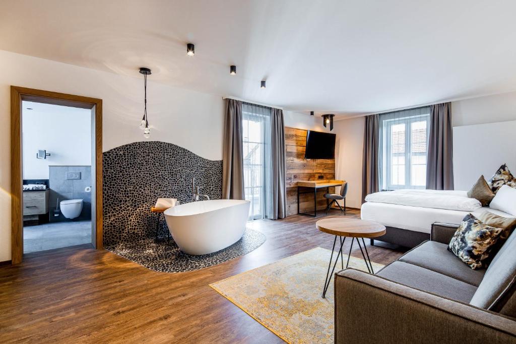 Posezení v ubytování Hotel Zum Stemplinger Hansl