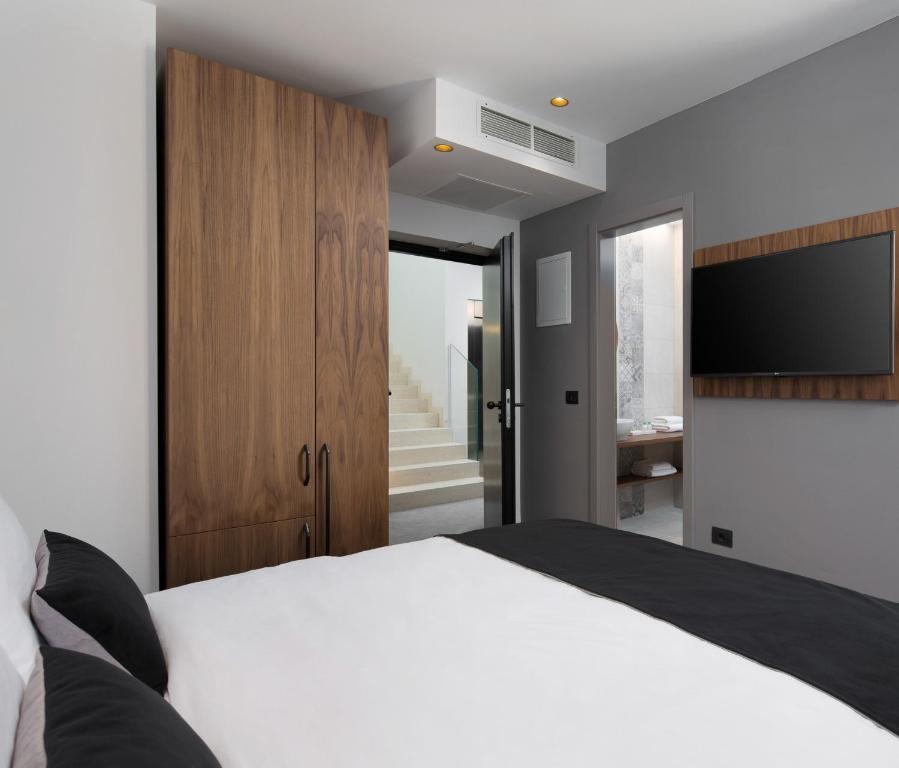 Postel nebo postele na pokoji v ubytování Hotel Delfin