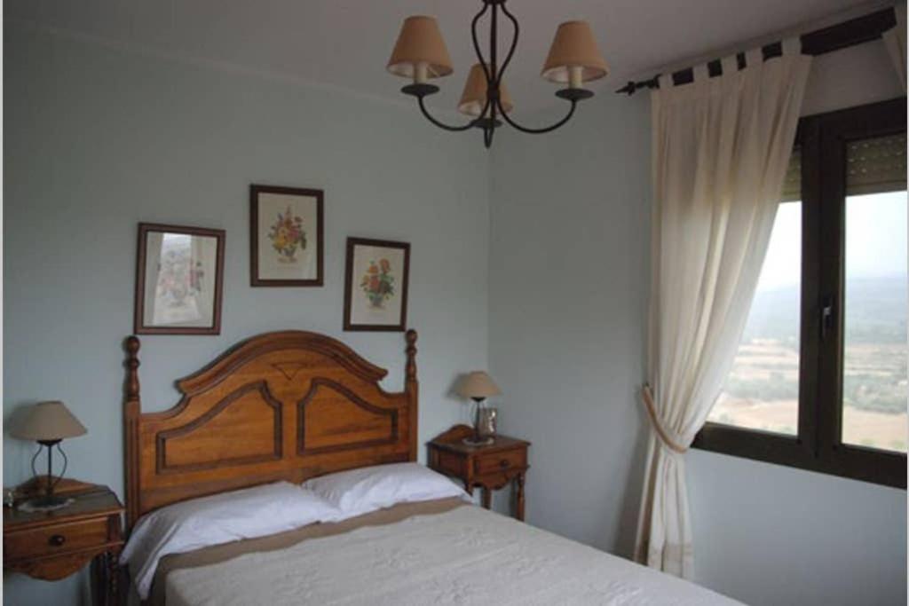Кровать или кровати в номере Casa Valero