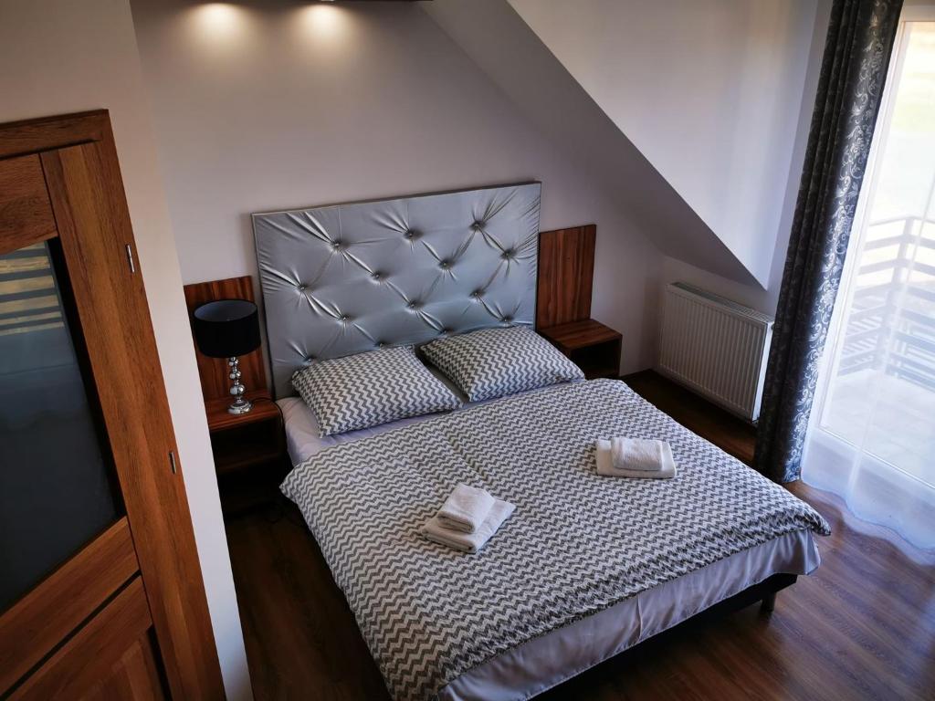 Postel nebo postele na pokoji v ubytování Holiday Amber -
