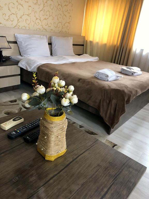 Postel nebo postele na pokoji v ubytování Bonus Hotel