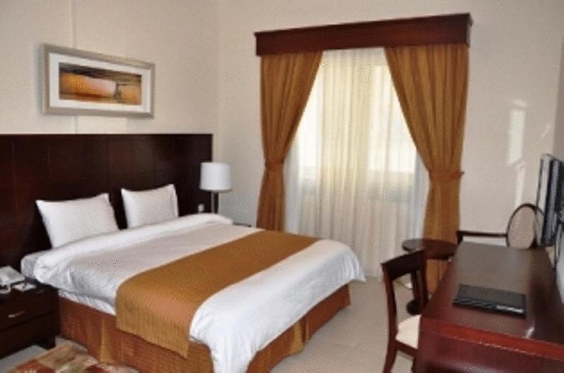 Postel nebo postele na pokoji v ubytování Akas-Inn Hotel Apartment