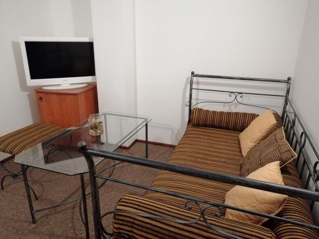 En eller flere senge i et værelse på Хотел-Ресторант Тиролиа